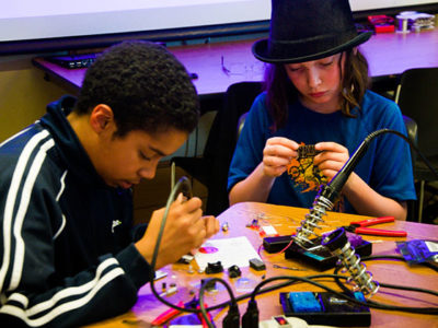 San Francisco Public Library Bernal Heights solder workshop, Nov-2013 from Mitch Altman via Flickr (CC BY-SA 2.0)